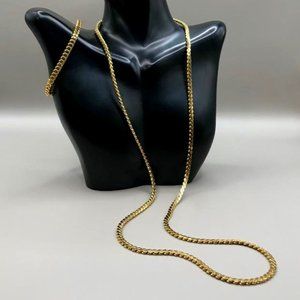 Direction One Gold-Tone Necklace Paired with Unmarked Bracelet